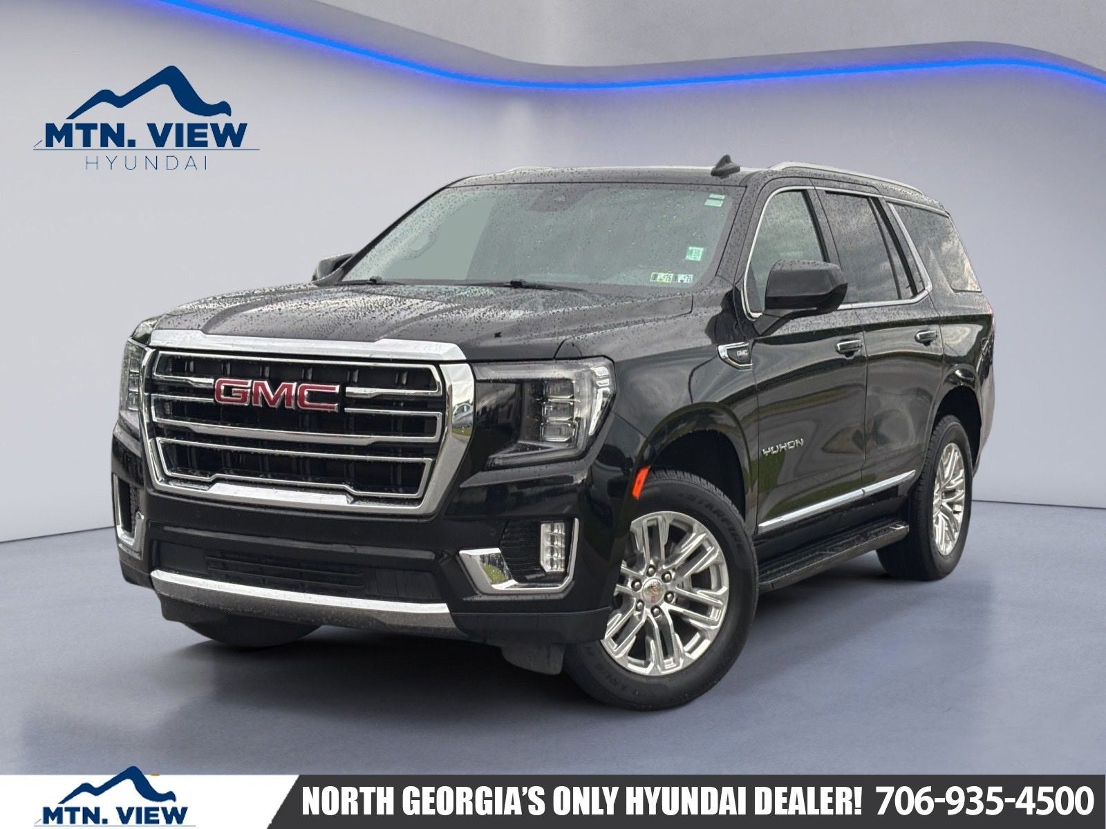 2024 GMC Yukon SLT in Onyx Black — front three-quarter view