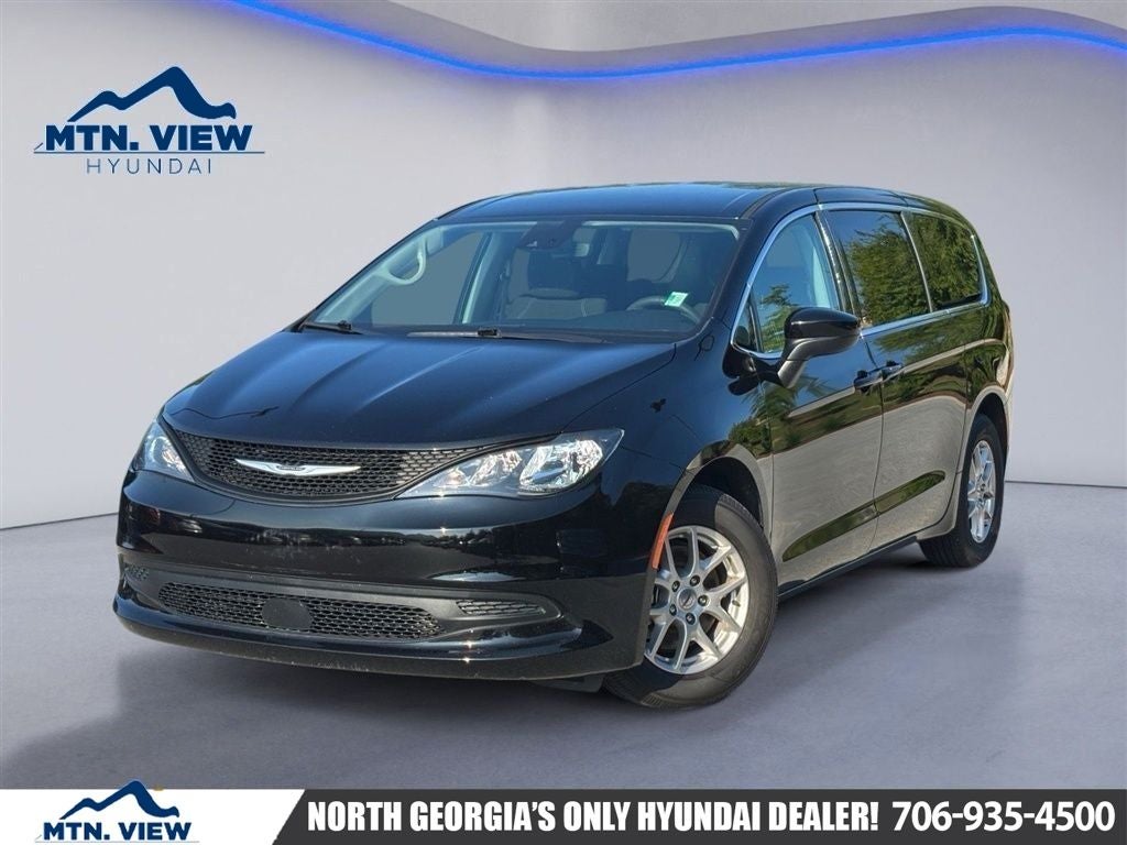 2024 Chrysler Voyager LX in Diamond Black Crystal Pearlcoat — front three-quarter view
