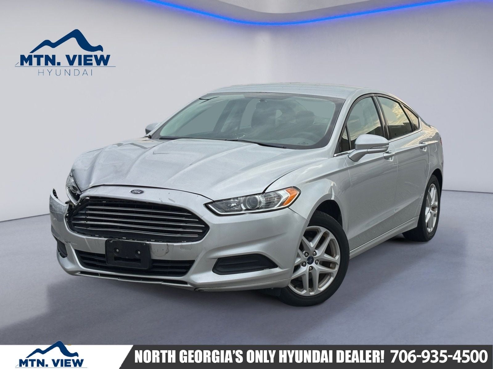 2014 Ford Fusion SE in Ingot Silver — front three-quarter view