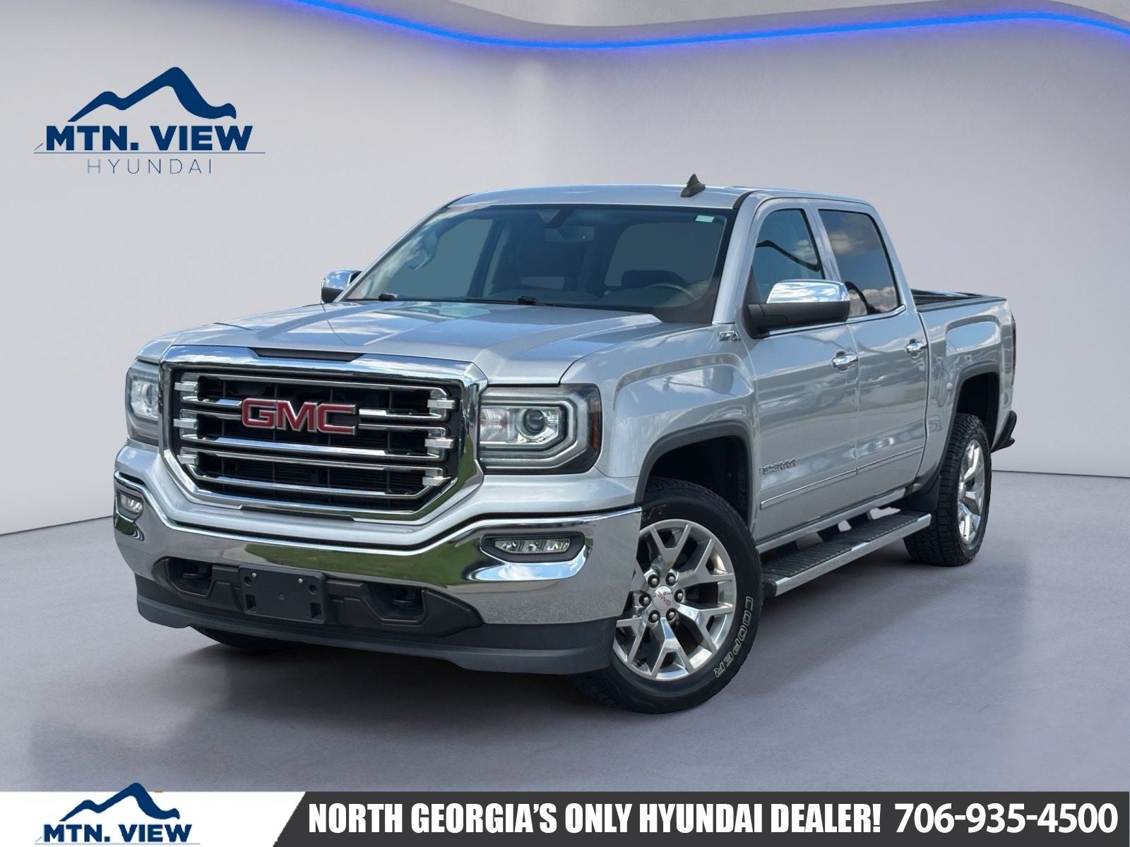 2018 GMC Sierra 1500 SLT in Quicksilver Metallic — front three-quarter view