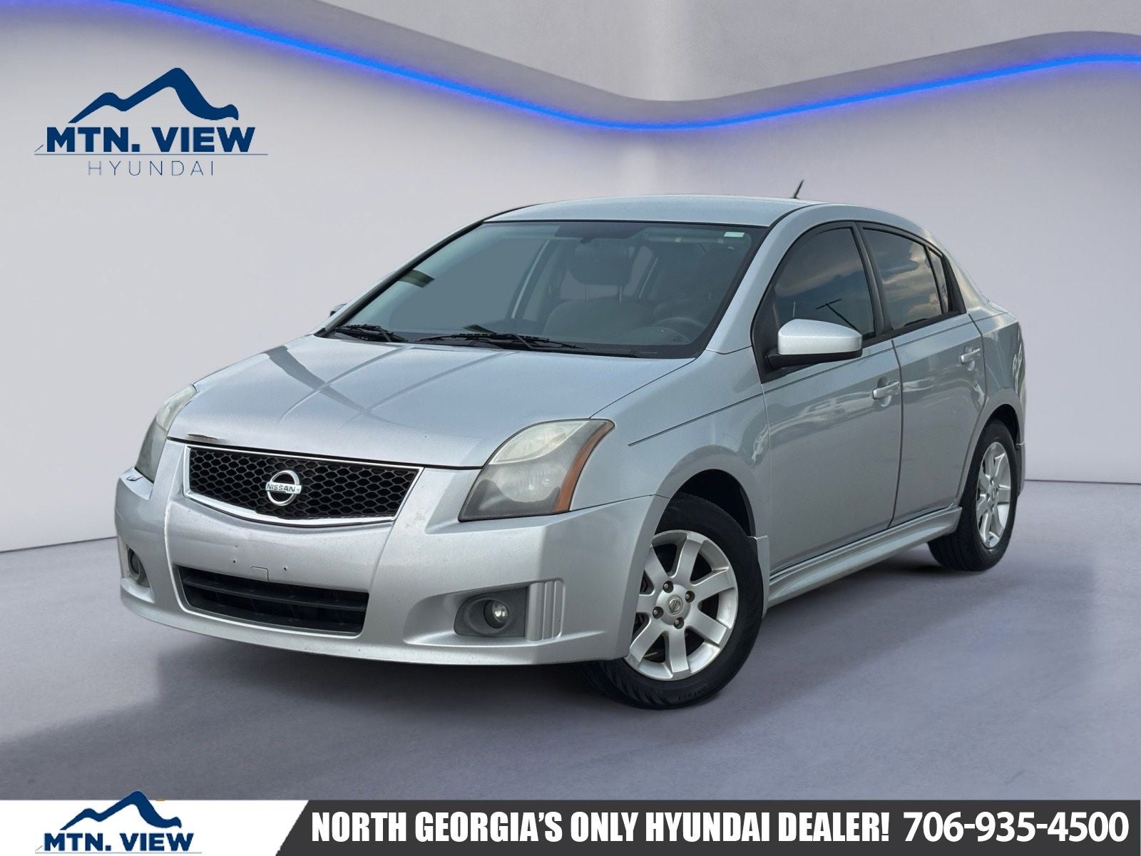 2012 Nissan Sentra 2.0 SR in Brilliant Silver Metallic — front three-quarter view