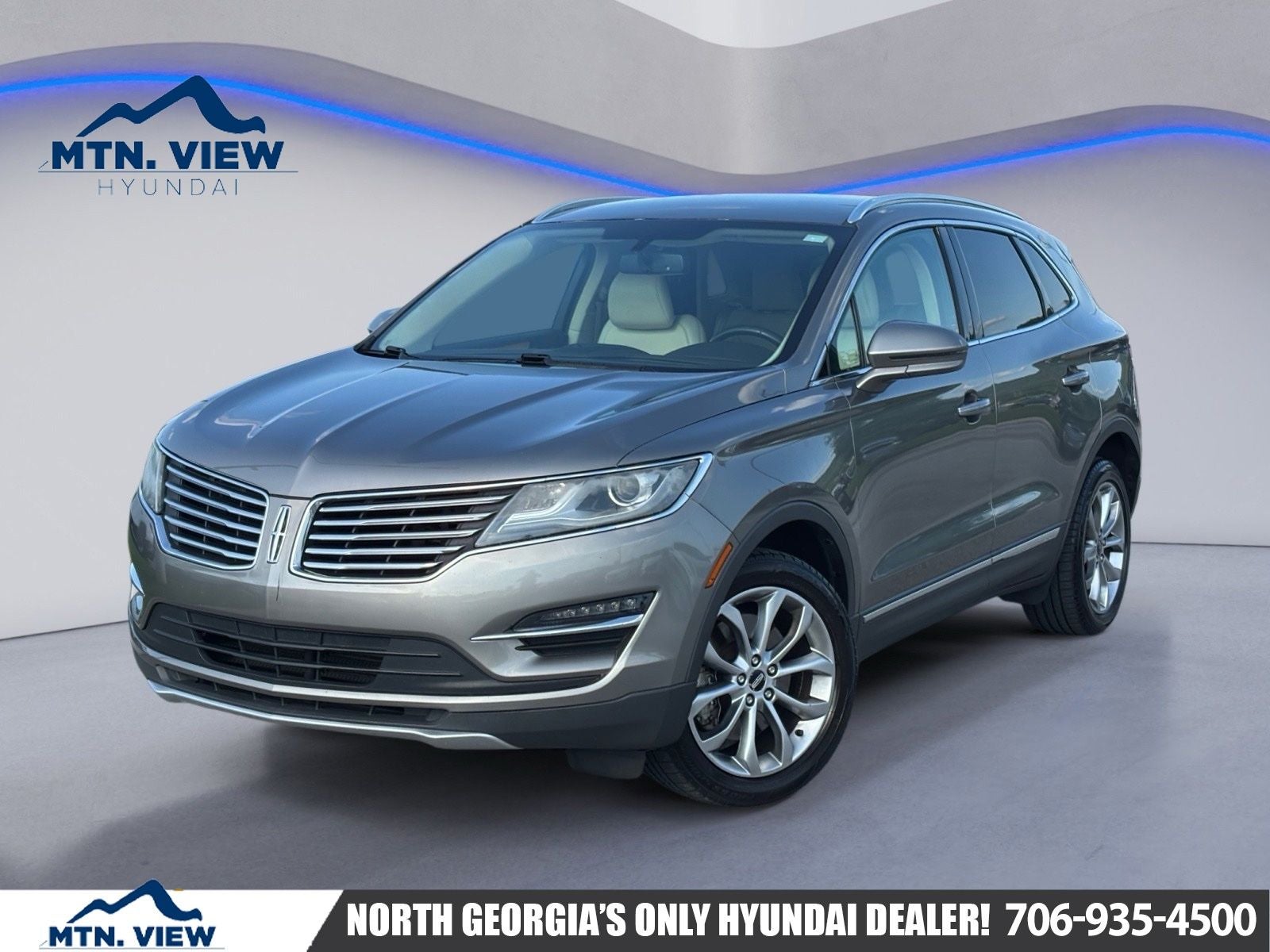 2016 Lincoln MKC Select in Luxe Metallic — front three-quarter view