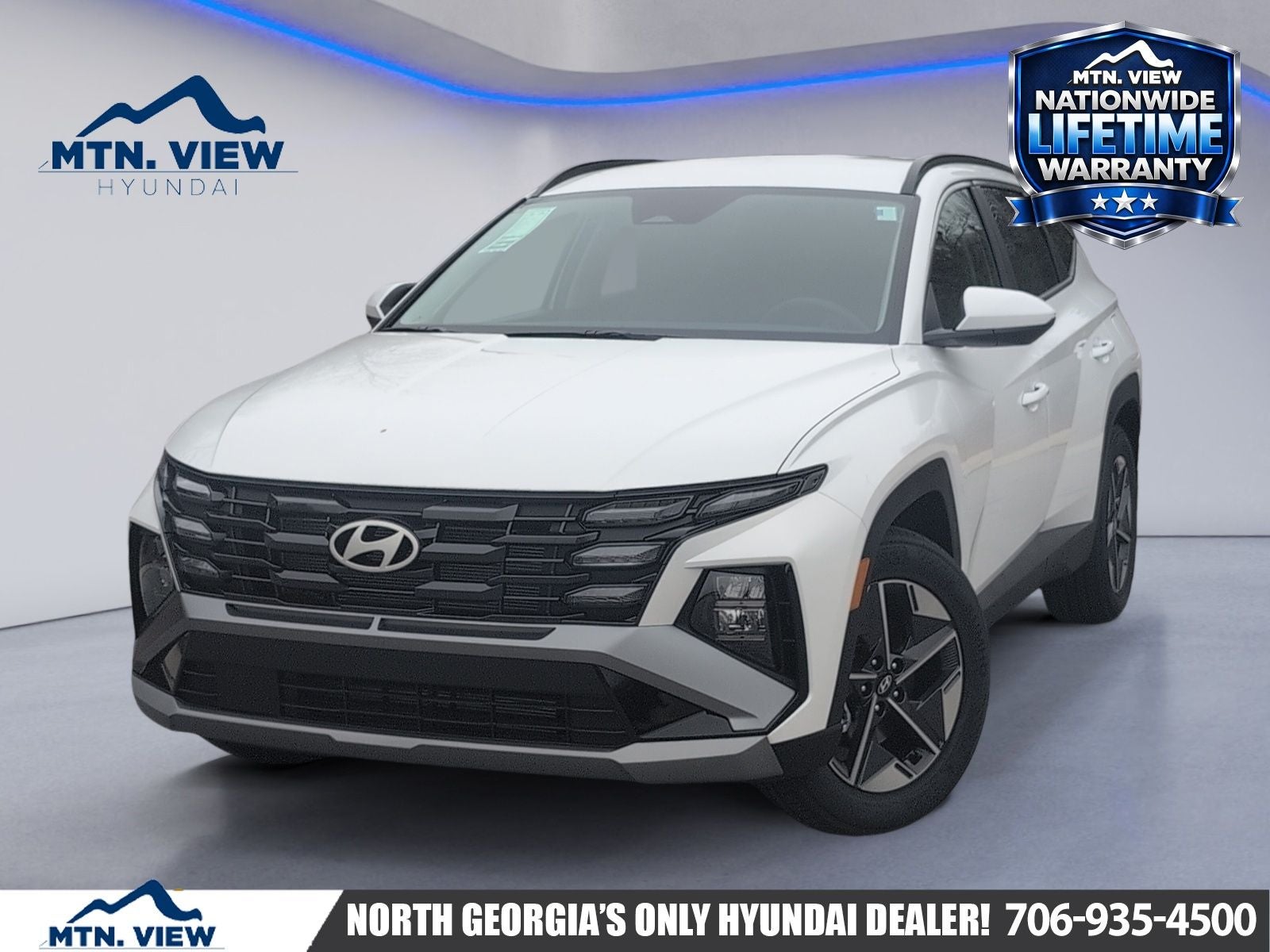2026 Hyundai TUCSON SEL in White Pearl — front three-quarter view